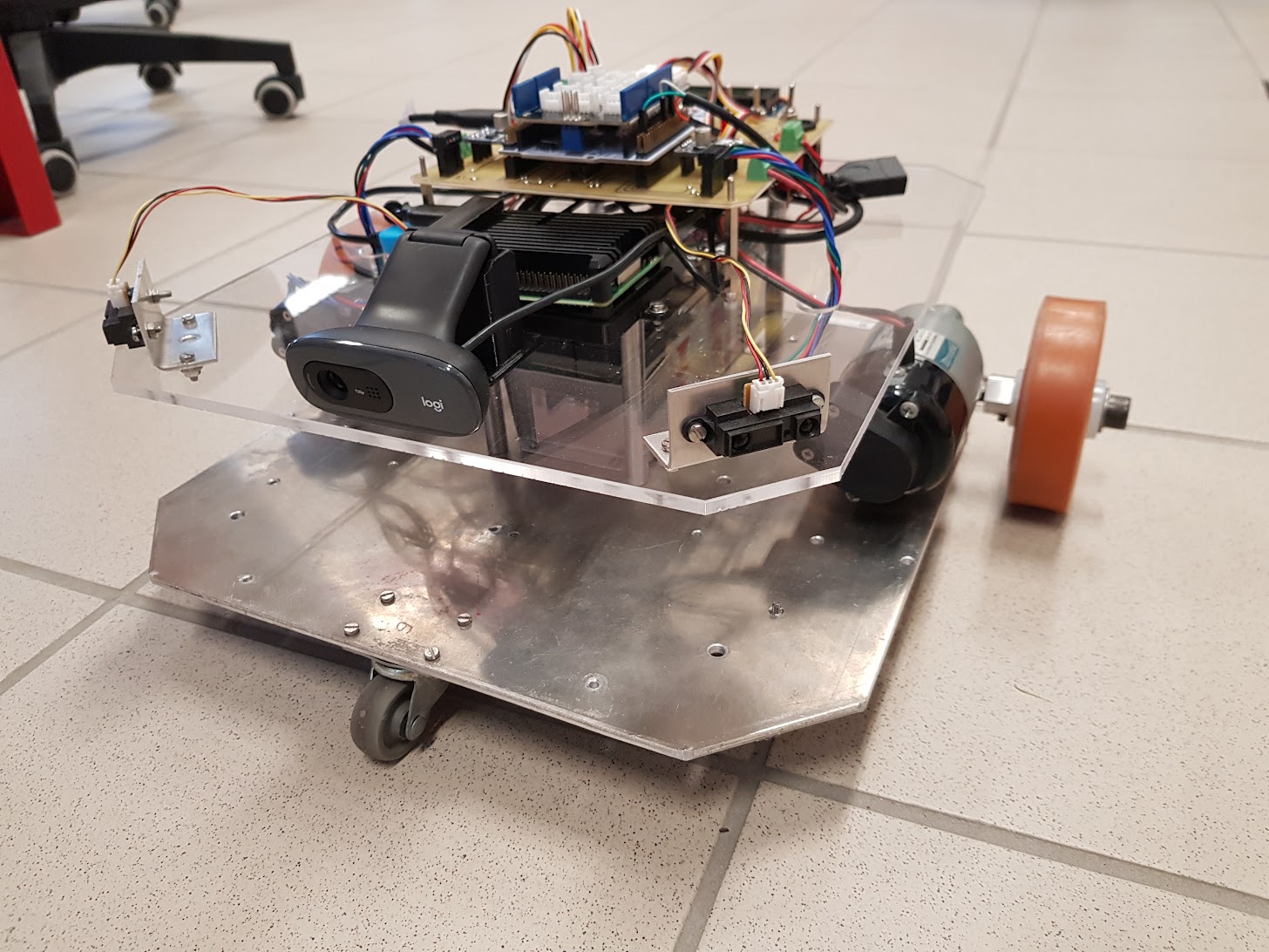 ENIB ROS2 mobile robot viewed from the front-left, showing its camera, sensors and electronic assemblies